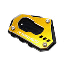 Base Ampliada de Descanso Lateral p/ BMW R1250GS/Adventure (Brinde: Tampa do Bico Pneu)